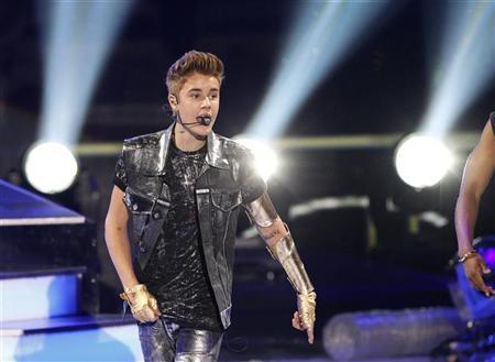 Bieber spotlights his grown-up side in flashy new video