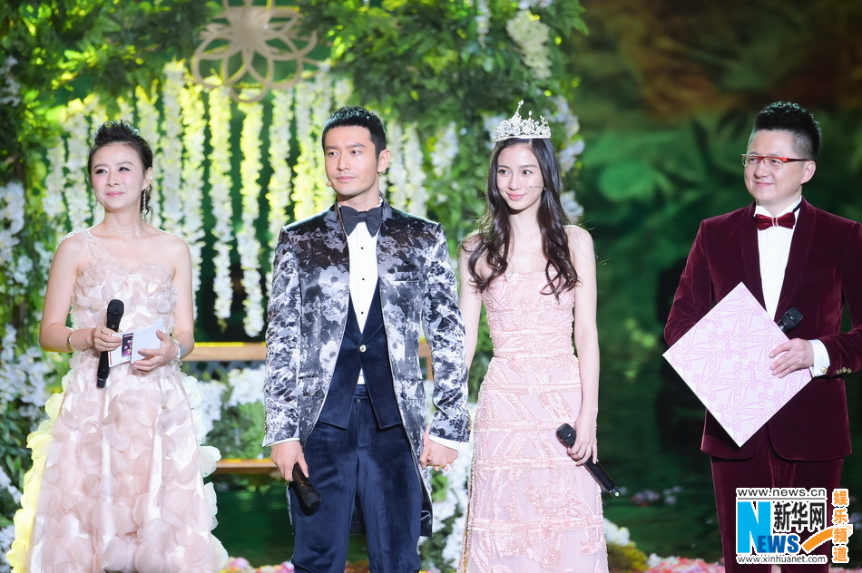Huang Xiaoming, Angelababy attend New Year concert