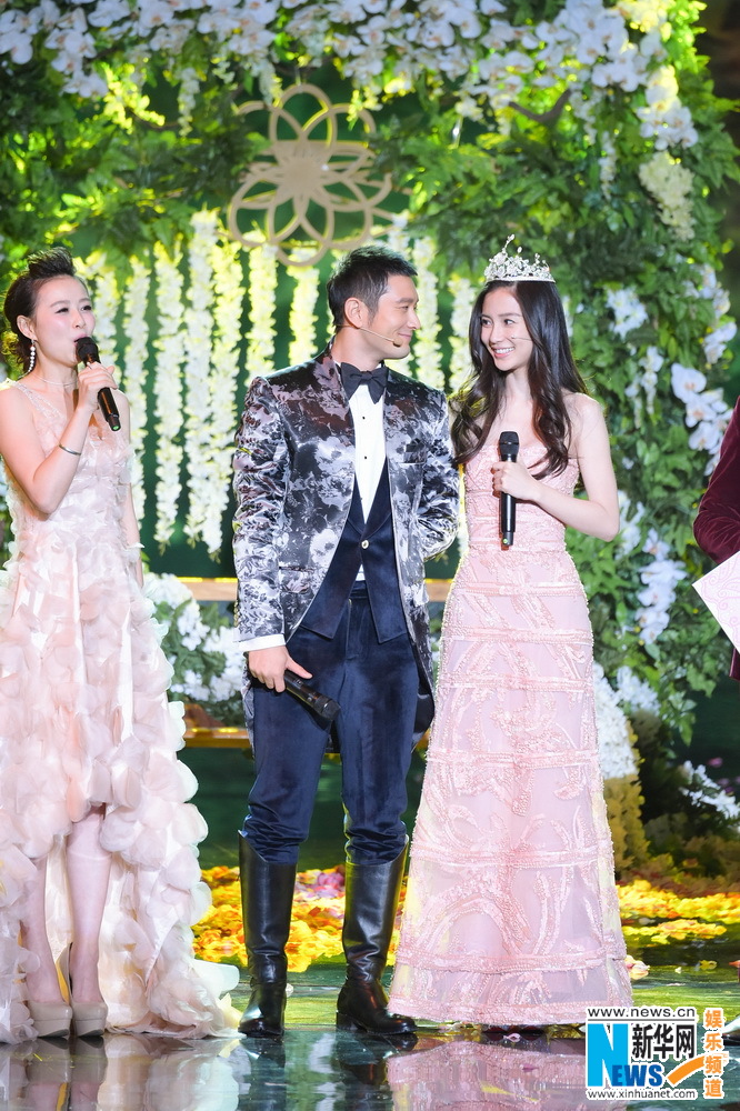 Huang Xiaoming, Angelababy attend New Year concert
