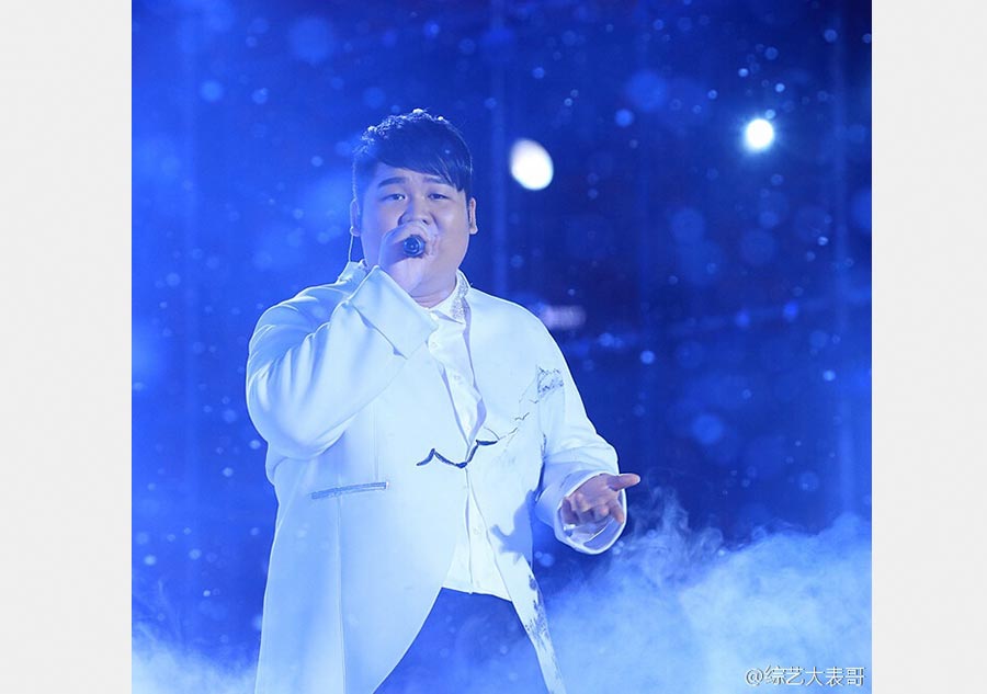 Zhang Lei wins fourth season of <EM>Voice of China</EM>