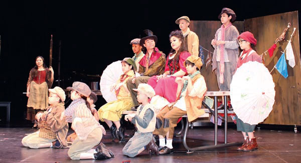 chinese kids help stage oliver!