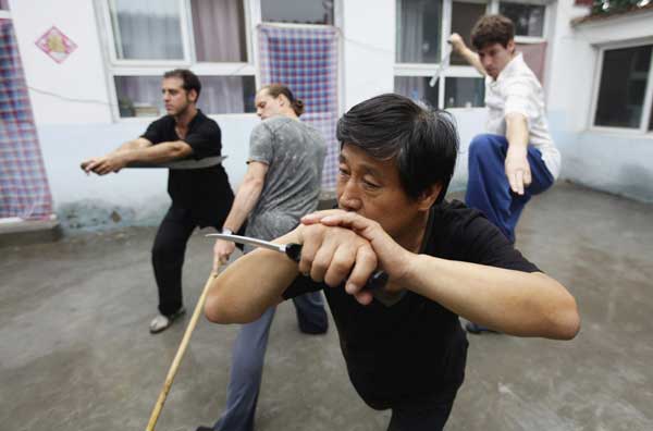 Martial arts master instructs foreigners