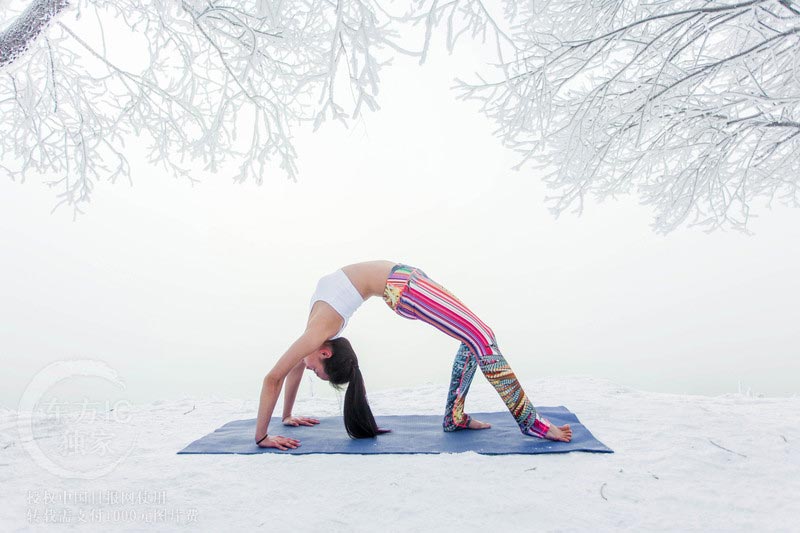Woman does Yoga in minus 30 degrees deep freeze