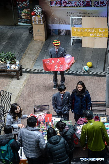 More than 60 int'l students participate in charity bazaar in Hangzhou