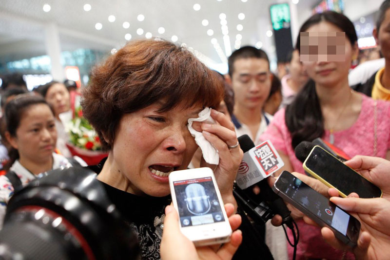 Tears and joy: Mother and child reunited after 25 years