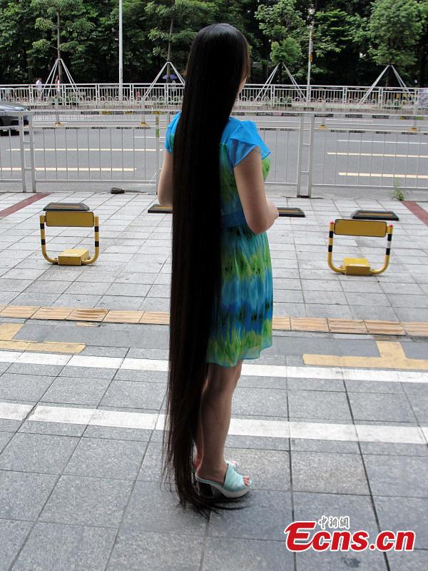 Woman auctions 2-meter-long hair for charity