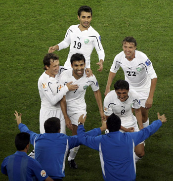 Uzbekistan beats Qatar 2-0 in opener of Asian Cup