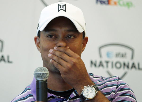 Woods cuts ties with IMG but sticks with agent