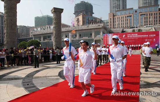 Western Guizhou city welcomes Games flame