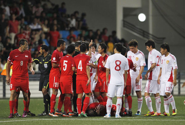 China bids farewell to world cup despite a 4-0 win