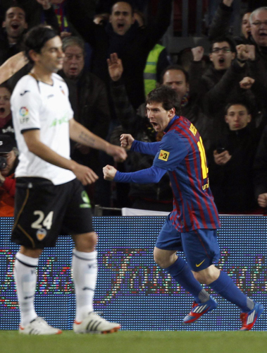 Messi scores four as Barca thrash Valencia