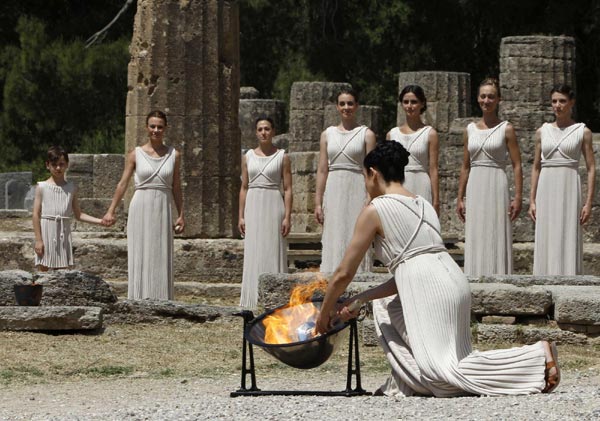 London 2012 torch lit in Olympia