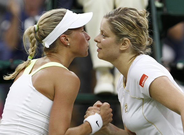 Classy Clijsters clatters through