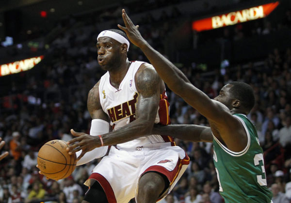 Heat rings in new season with win over Celtics