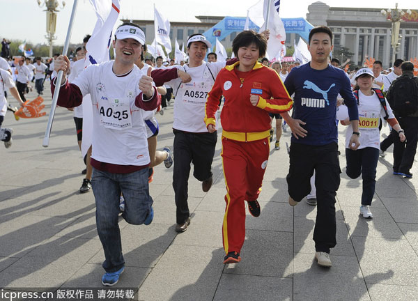 Beijing running festival attracts Ye Shiwen and 20,000 runners