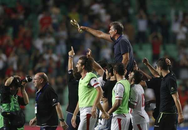 Iran 'in heaven' as soccer team qualifies for 2014 World Cup