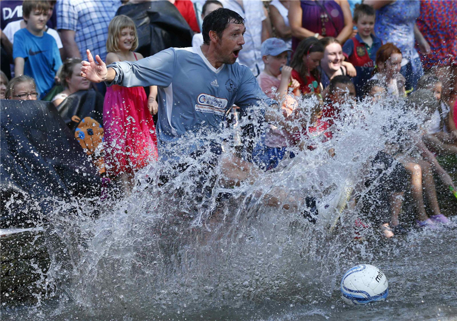 Annual river soccer match trots into village