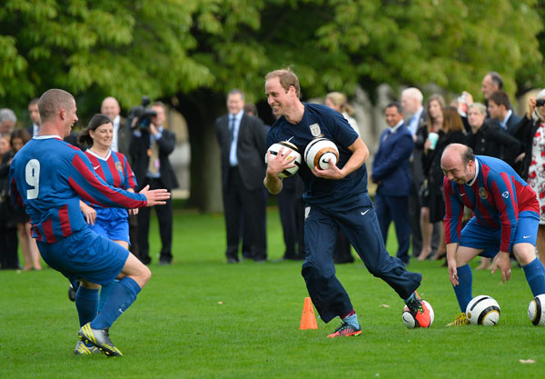 A football match hosted at Buckingham Palace