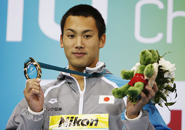 Japanese swimmer expelled for stealing camera