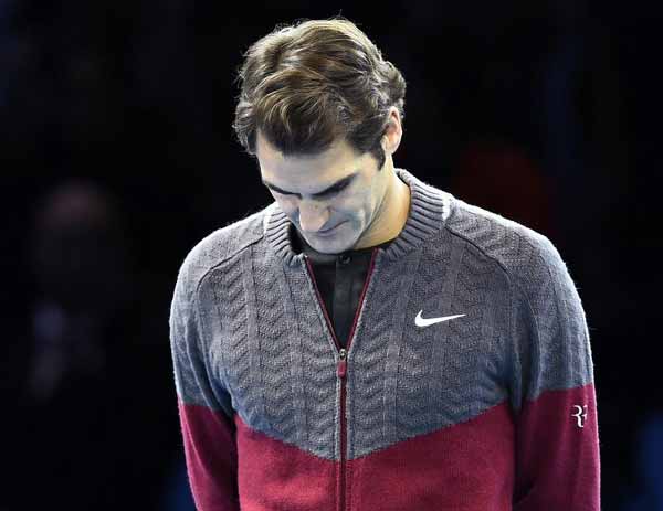 Federer seeks back treatment in Lille
