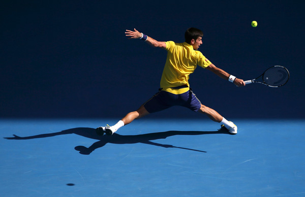 Djokovic, Williams begin Australian Open title defence with easy wins