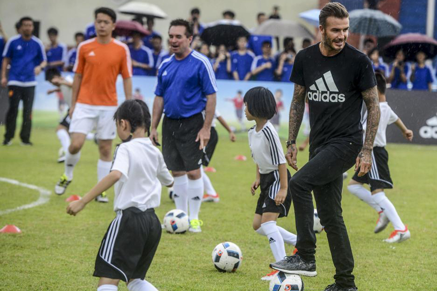 David Beckham promotes football in South China school
