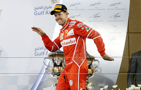 Vettel beats Hamilton in tense Bahrain GP