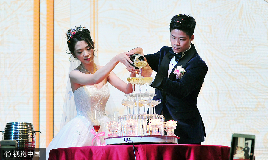 Chinese sprinter Su Bingtian and wife hold wedding ceremony in hometown