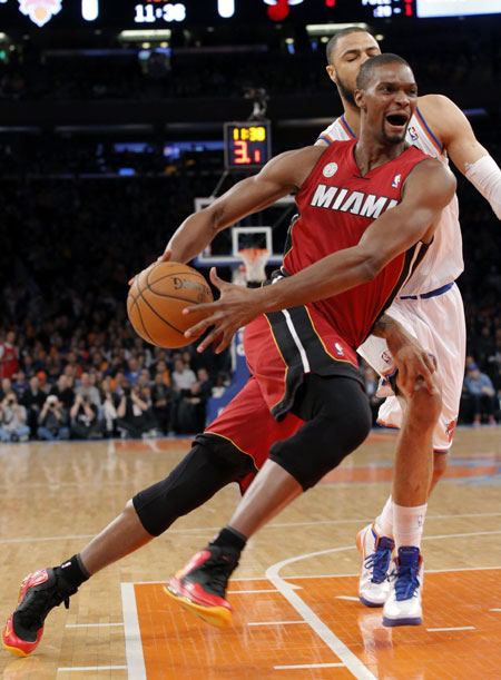 Heat beat Knicks, win 14th straight