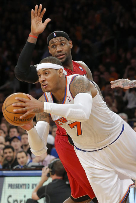 Heat beat Knicks, win 14th straight