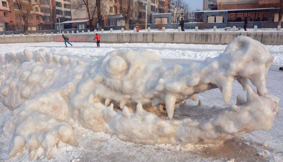 Crocodile sculpture made with snow