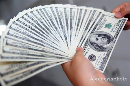 Yuan rises to record high against US dollar