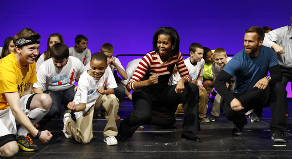 US First Lady Michelle Obama performs dance