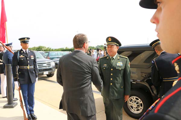 Carter greets General Fan at Pentagon