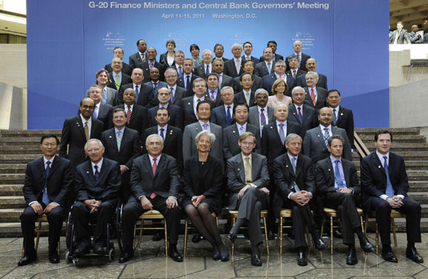 G20 finance ministers and central bank governors gather for a group photo during the International Monetary Fund and World Bank Spring Meetings at IMF headquarters in Washington, April 15, 2011. G20 begins work on global imbalances