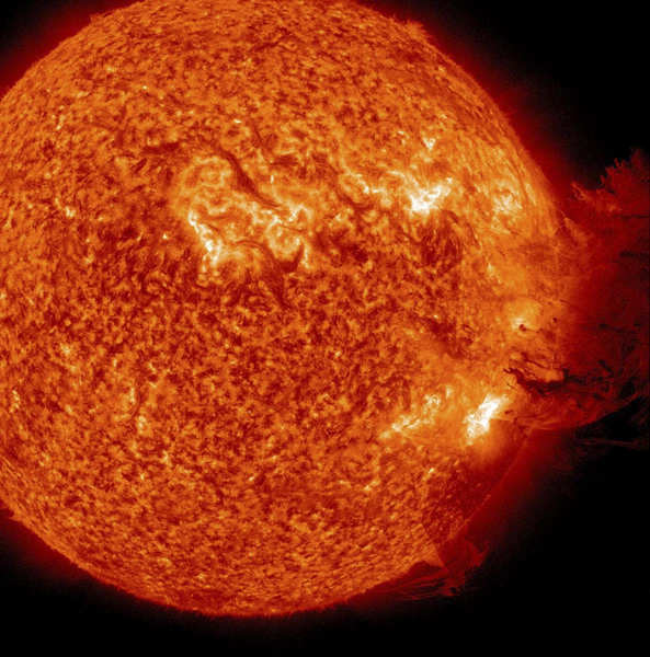 Solar flare erupts, creating spectacular images