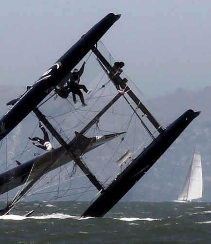 Sailing boat capsizes during America's Cup