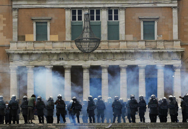 Greece set for final vote on cuts after riots