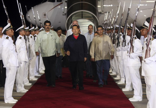 Chavez returns to Venezuela from Cuba after chemo