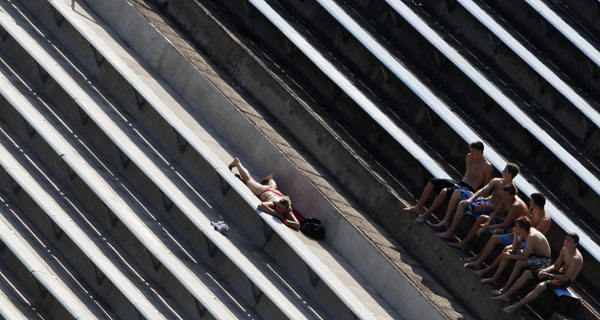 People out for sunbath in Prague