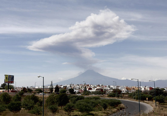 Volcano near Mexico City spews ash, smoke