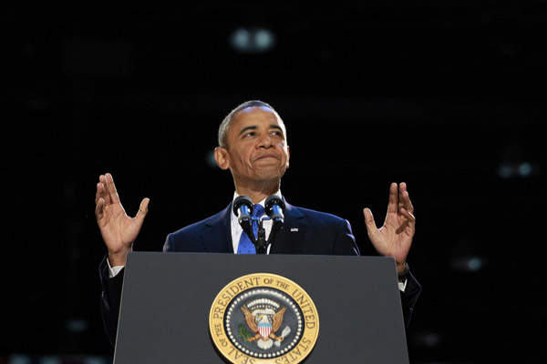 Obama wins second term, challenges await