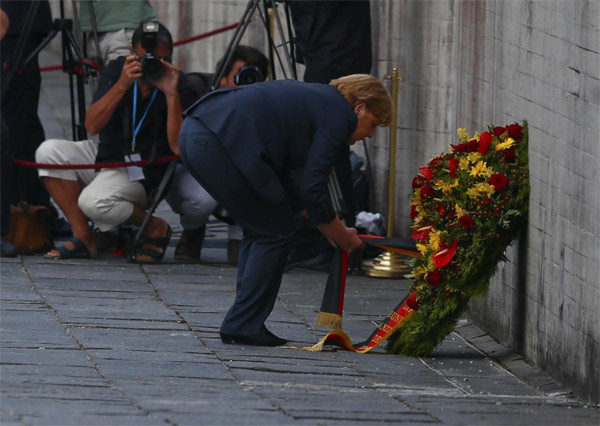 Merkel makes historic visit to Nazis' Dachau camp