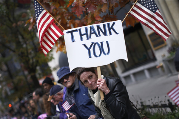 US honors its veterans with ceremonies, parades