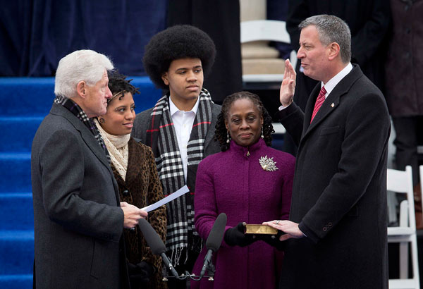 De Blasio sworn in as New York mayor, succeeding Bloomberg
