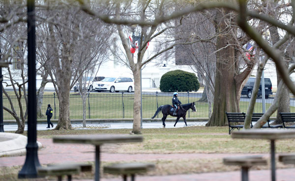 White House on lockdown as man tries to climb fence