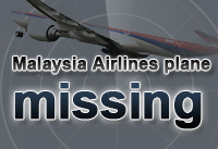 Families of missing jet passengers arrive in Kuala Laumpur
