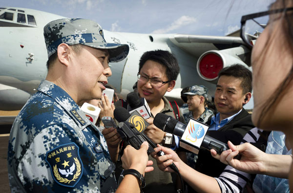 Chinese aircraft spots suspicious objects in MH370