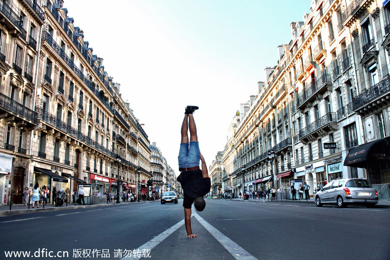 Breakdancer 'freezes' in front of Paris landmarks