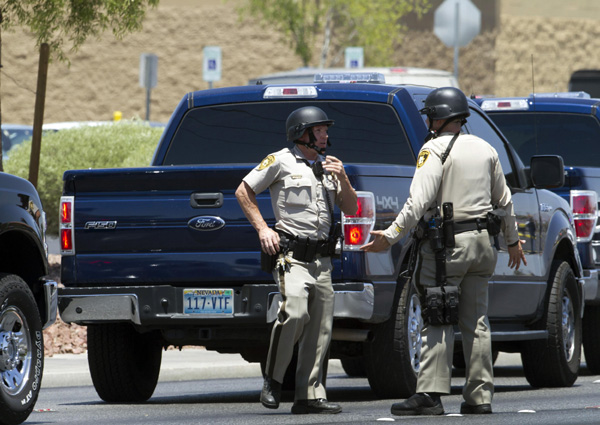2 officers, 3 others dead in Las Vegas shooting